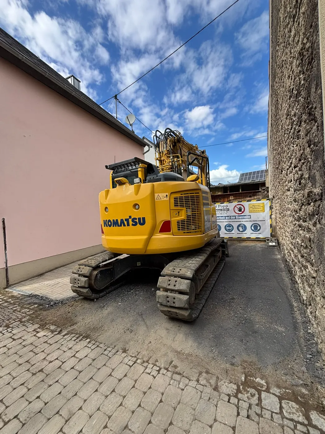 Komatsu Kompaktbagger auf der Abbruchbaustelle in Ochtendung